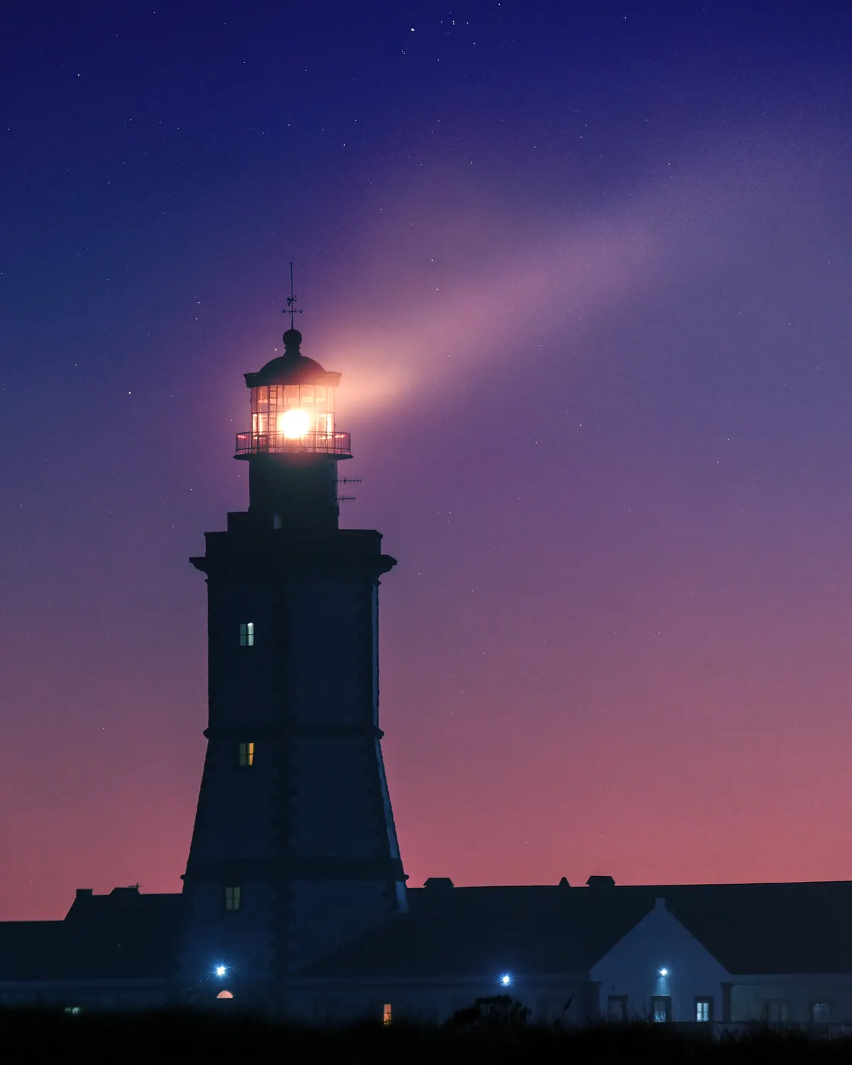 A lighthouse standing above the coast